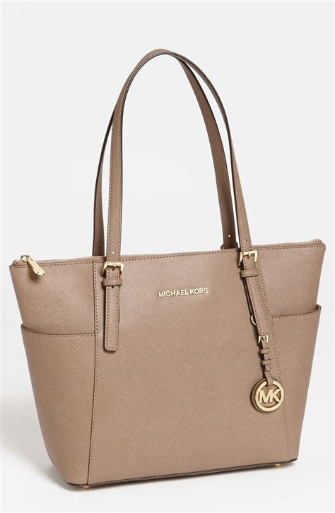 michael kors jet set leather tote bag uk|Michael Kors bag with airplanes.